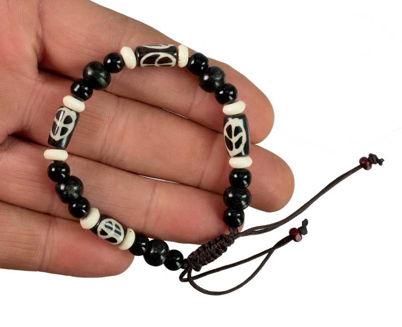 Bracelet tibétain perles agate et os de bovin – Symbole de paix artisanale du Népal