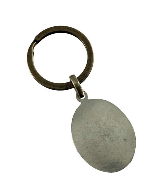 Porte-Clé Om Bouddhiste Tibétain en Laiton et Résine – Népal