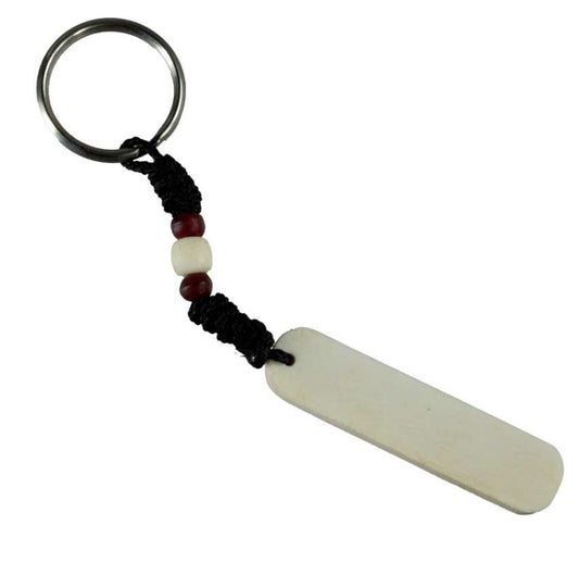 Porte-Clés Mantra Bouddhiste en Os de Bovin – Artisanat Traditionnel du Népal