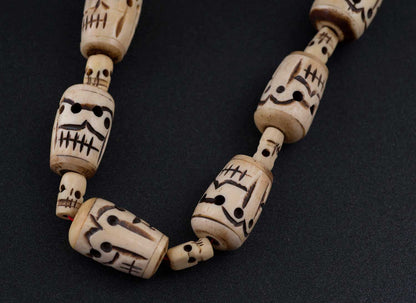 Collier Chamanique Têtes de Mort Népalais – Bijou Spirituel en Os de Bovin