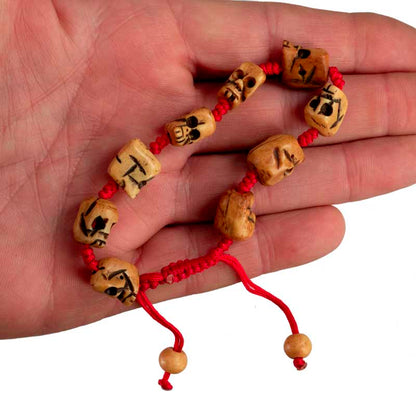 Bracelet Têtes de Mort en Os de Bovin – Bracelet Bouddhiste Artisanal du Népal