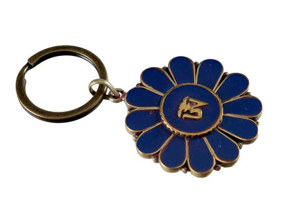 Porte-Clé Om Bouddhiste en Laiton et Résine Bleue – Artisanat Népalais