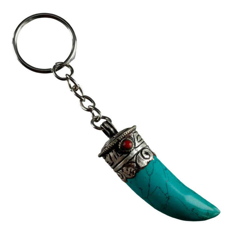 Porte-Clé Griffe de Tigre en Métal et Résine Turquoise – Népal