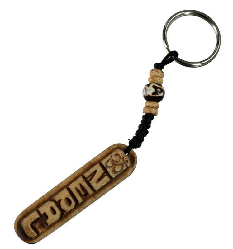 Porte-Clés Om Artisanal en Os de Bovin – Artisanat Traditionnel du Népal