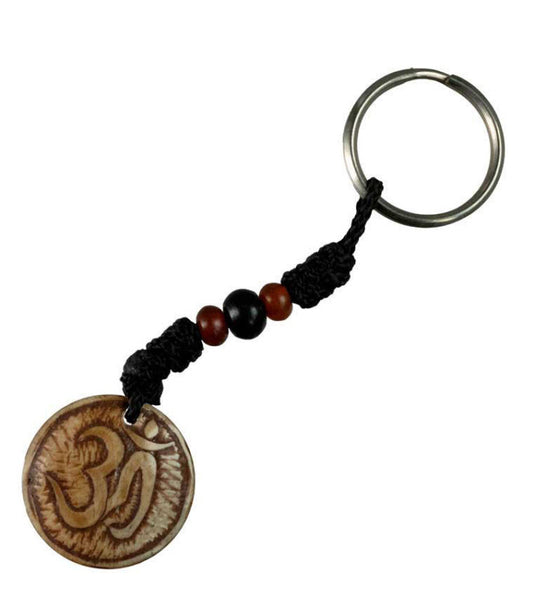 Porte-Clés Om Hindouiste en Os de Bovin – Artisanat Traditionnel du Népal