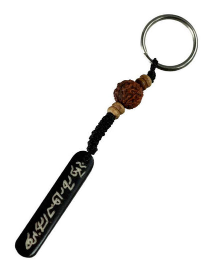 Porte-Clés Artisanal en Os de Bovin avec Perle Rudraksha – Artisanat du Népal