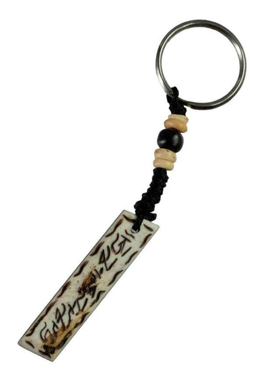 Porte-Clés Mantra Bouddhiste en Os de Bovin – Artisanat Traditionnel du Népal