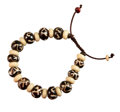 Mala bracelet tibétain symbole Om – Bijou de méditation artisanal du Népal