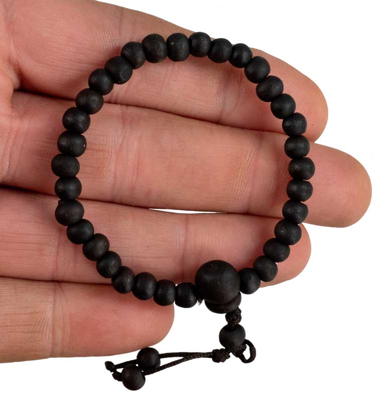 Bracelet tibétain perles de bois teintées noires – Bijou artisanal spirituel du Népal