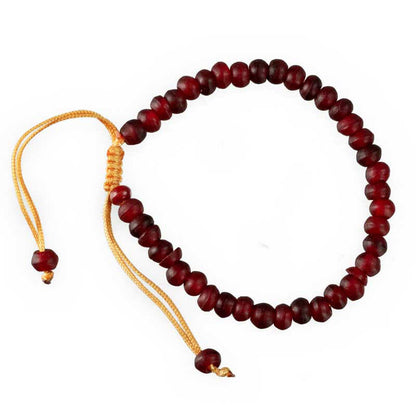 Bracelet tibétain perles bordeaux en corne teintée – Bijou artisanal népalais