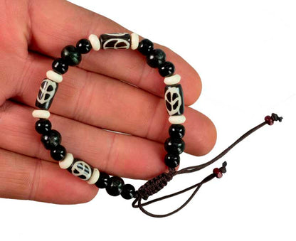 Bracelet tibétain perles agate et os de bovin – Symbole de paix artisanale du Népal