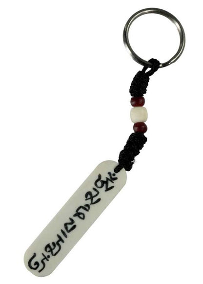 Porte-Clés Mantra Bouddhiste en Os de Bovin – Artisanat Traditionnel du Népal