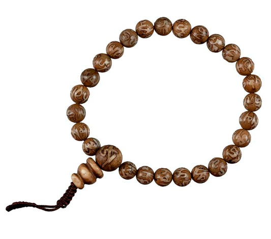 Bracelet mala en coquillage – bracelet de prières bouddhiste artisanal du Népal