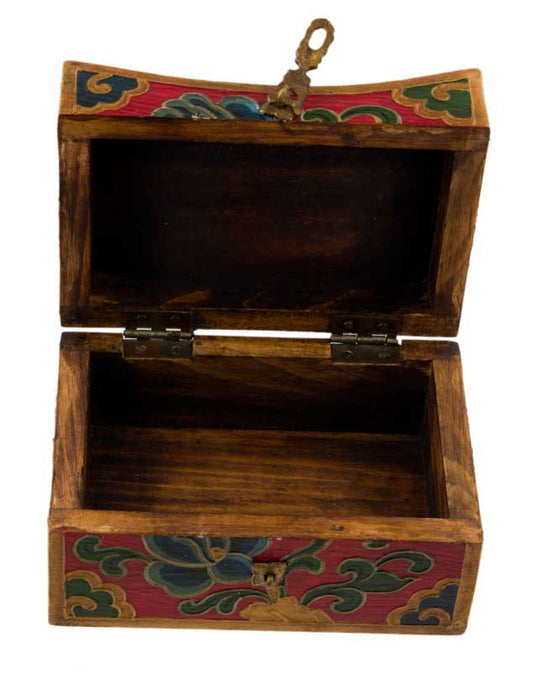 Coffret tibétain en bois peint – forme oreiller, décor Vajra et Joyaux d’offrande
